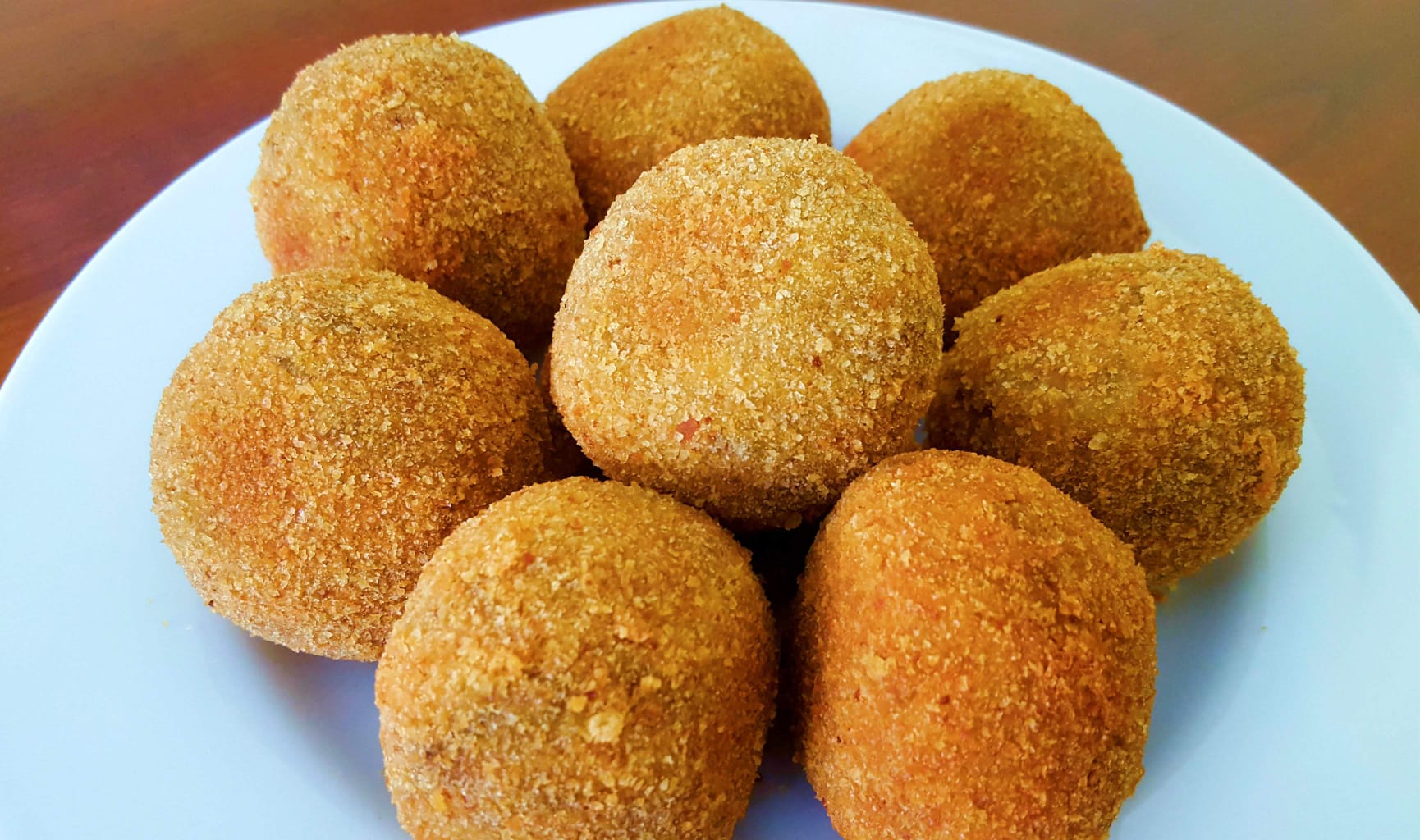 Polpette di melanzane con cuore filante: Ricetta sfiziosa e irresistibile in 30 minuti!