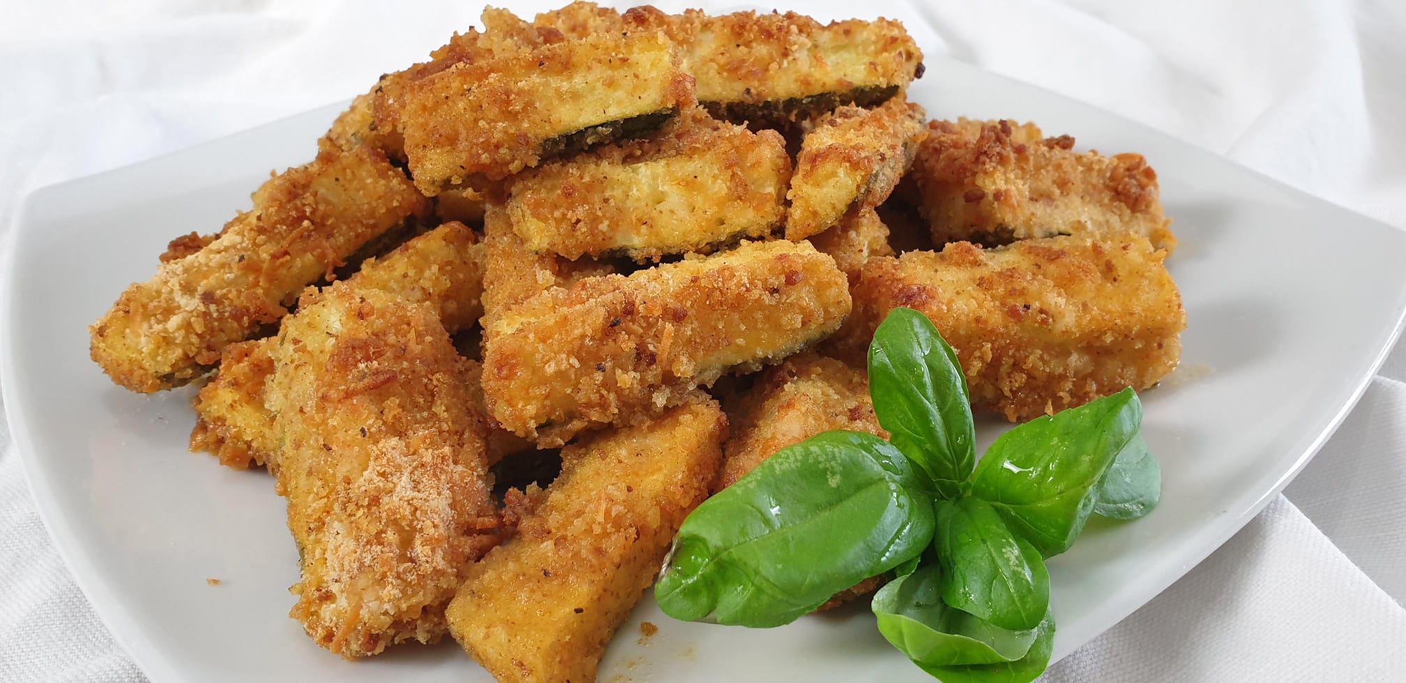 Zucchine panate, senza uova e senza frittura pronte in 20 minuti